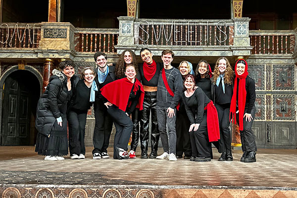 study abroad students on the London Globe Theater stage